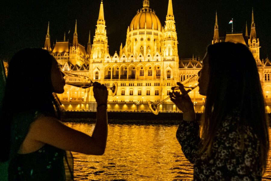 Budapest: Candlelit Dinner River Cruise with Live Music - Parliament at night: why the retractable windows matter