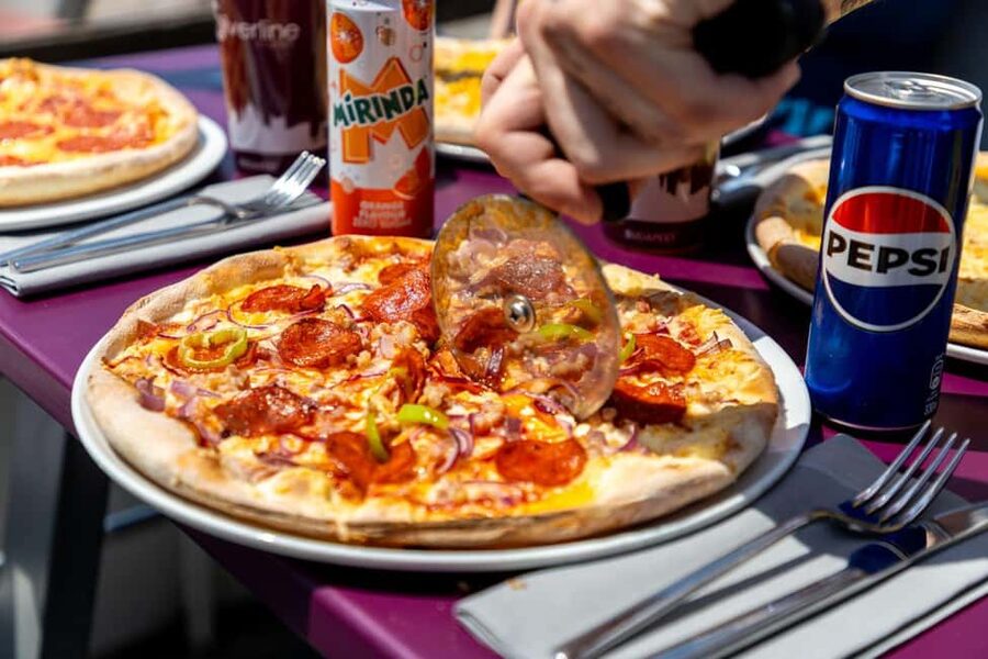 Budapest: Catamaran Pizza Cruise - The onboard vibe: outdoor decks, music volume, and a very social hour