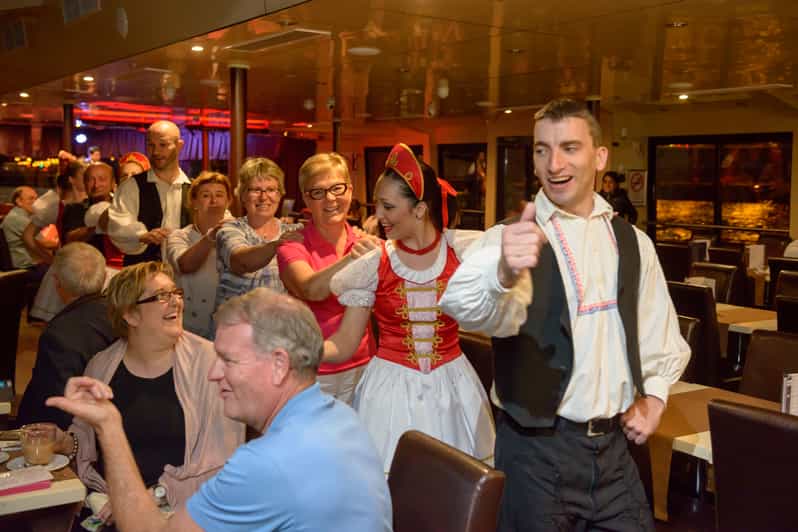 Budapest: Danube Cruise with Folk Dancing and Drinks - Budapest after dark, route by route: Margaret Bridge to Buda Castle