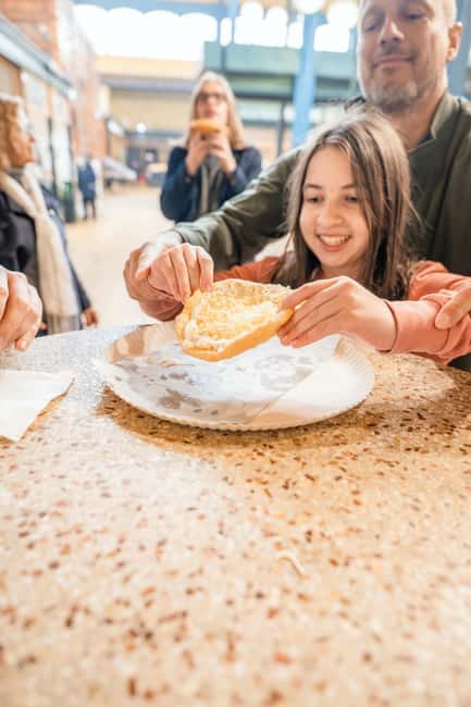 Budapest: Eat the Street, food tour with wine, 16+ tasting - Entering Fővám tér and the Great Market Hall Area