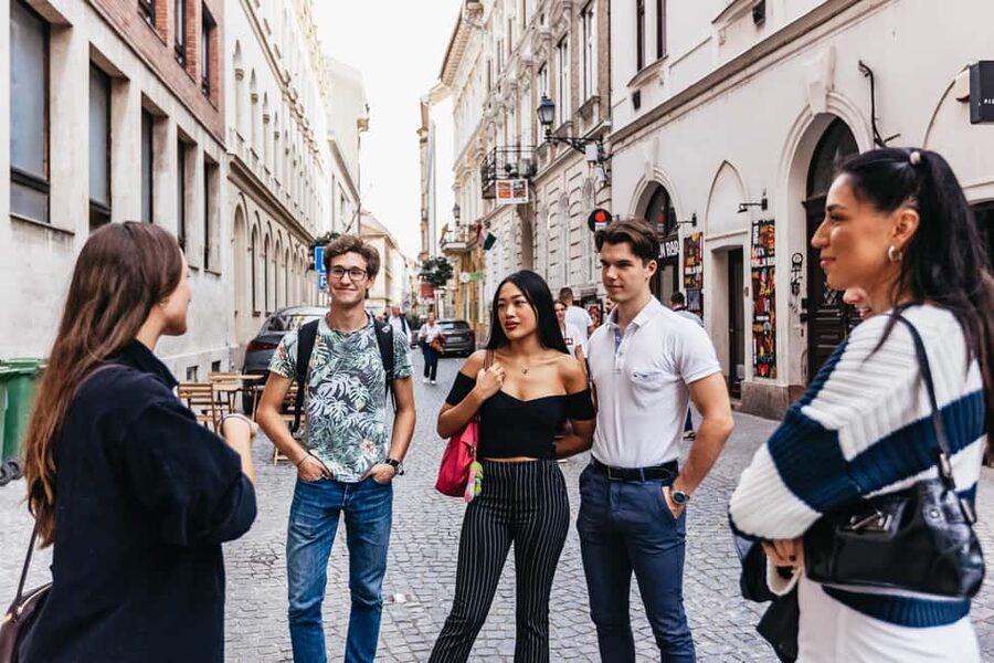 Budapest Food Walking Tour: Eat, Sip & Explore Like a Local - Guide style and pacing: why names like Eszti, Kitti, Laura, and Peter come up